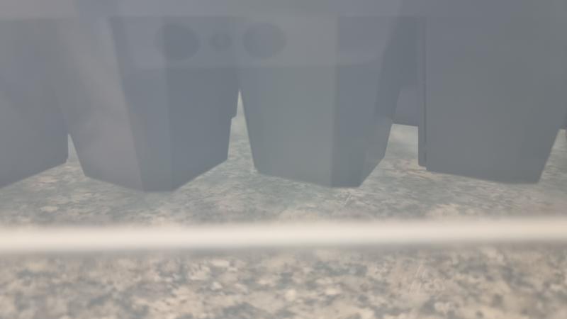 A slight gap between the bottom of my BFAPCT and the bottom of the tote, because the tote tapers off (inwards) towards the bottom.