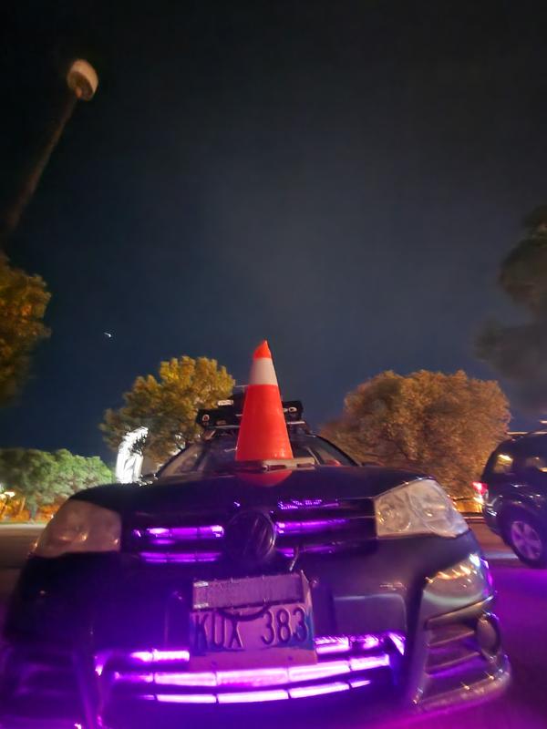 Golf(with pylon on its head) (exhasut clamp not visible )