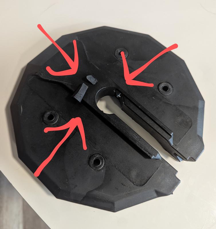 The broken tabs from the 30lb plate.