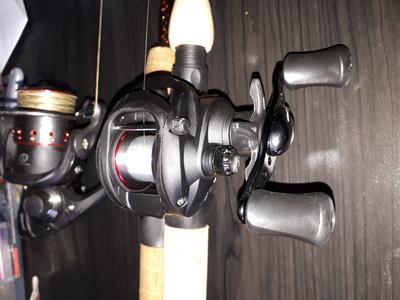 E-lite baitcaster combo beside E-lite medium spinning combo
