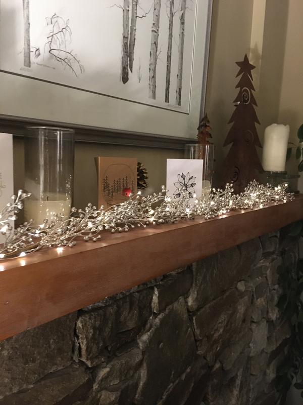 Mantle with garland and twinkle lights
