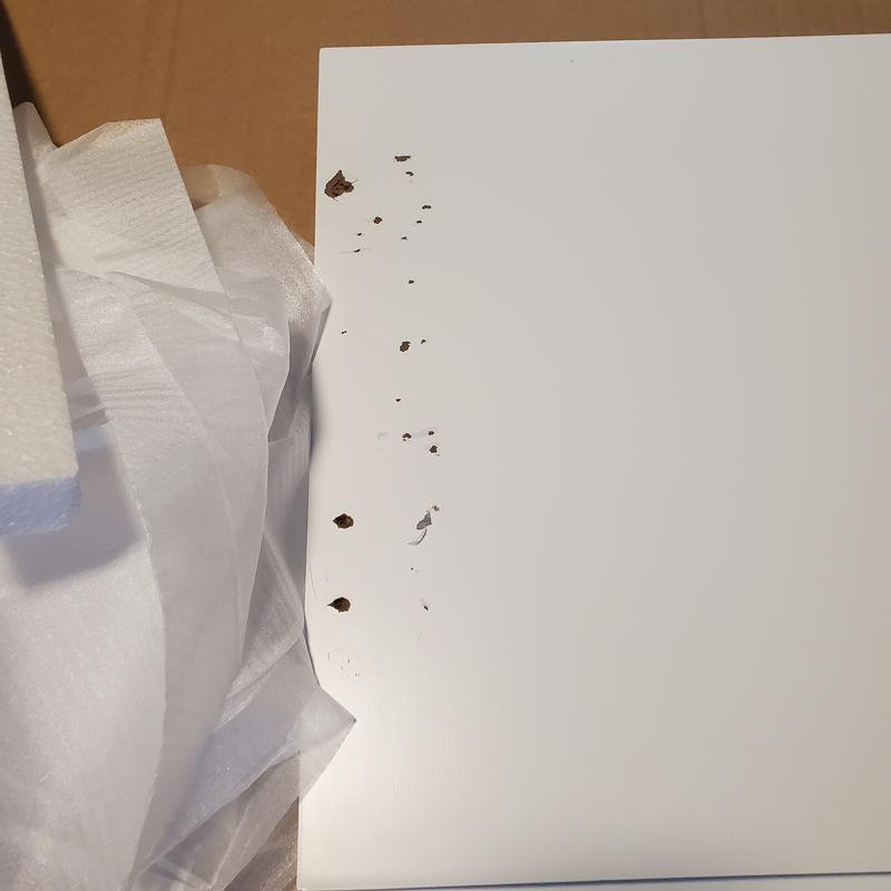 Damaged board and sealed hardware bags