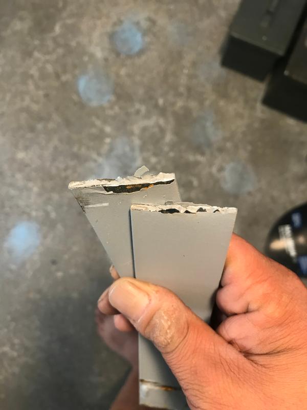 The snapped leaf spring up close