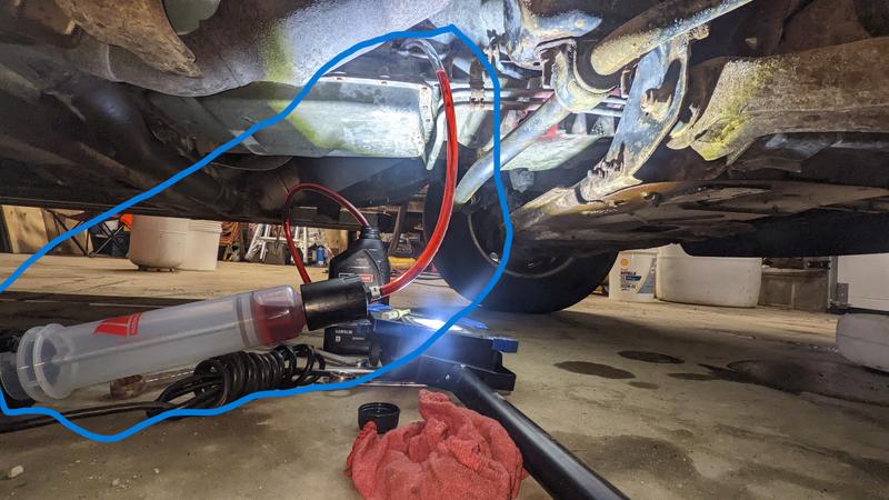 from bottle to transmission. funnel don't fit. this is  the only way to add oil in the tranny . I should have bought this tool many years ago.