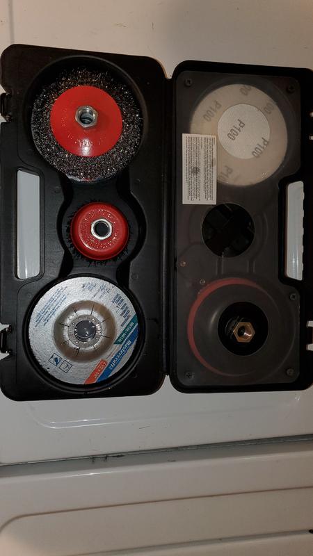 Inside with Plastic Guard. Held in by screws. Eventually the screws will fail making this a pain to close.