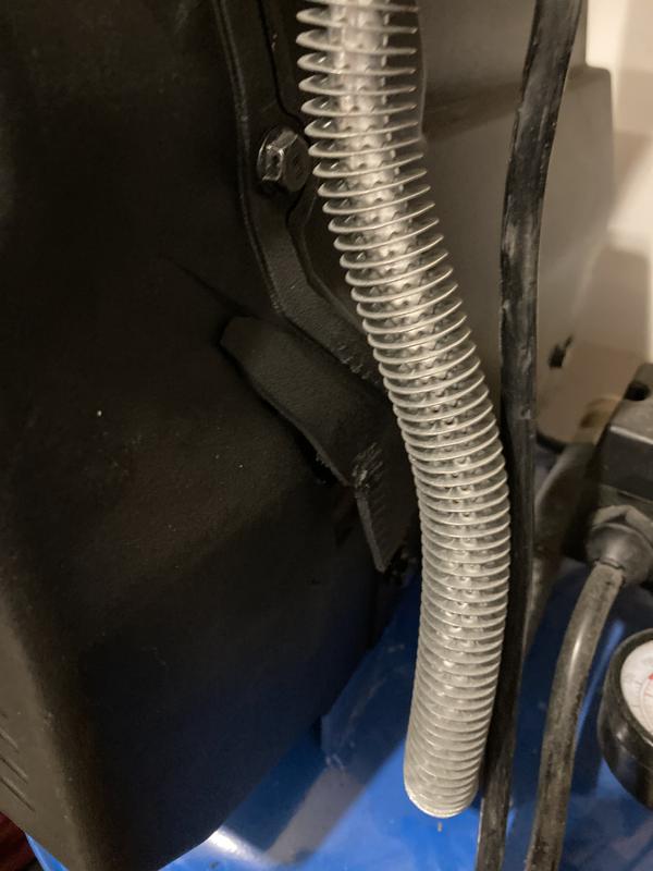 Notice the crack on the plastic shroud. (Right side)