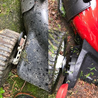 old vs new mower wheel attachment