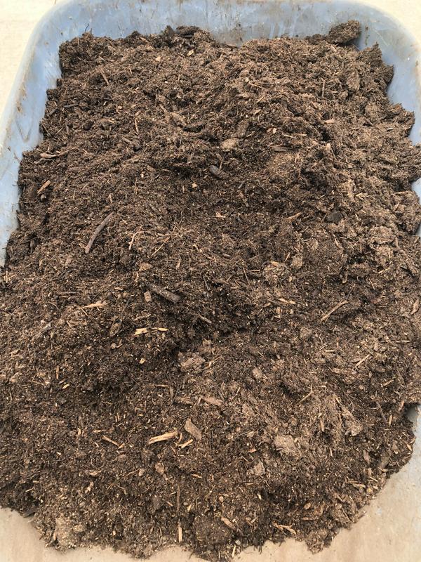 Full of wooden scraps and sticks.