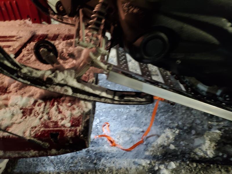 when my sled came down onto ram it made this side of ramp close like a door because hinge are on top of ramp for folding away my sled and me 980 pounds ramp good for 1500 this damage my sled they should have a locking bar to prevent ramp on hinge side