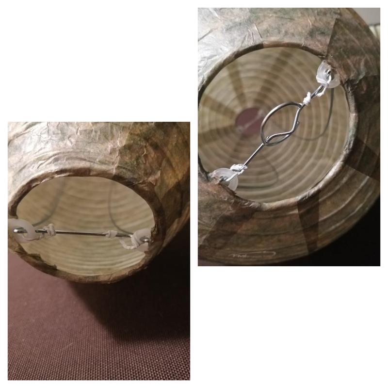 Insert twist tie through the metal end part and then through the plastic circle twisting the twist tie very close to the circle and twist it tight.