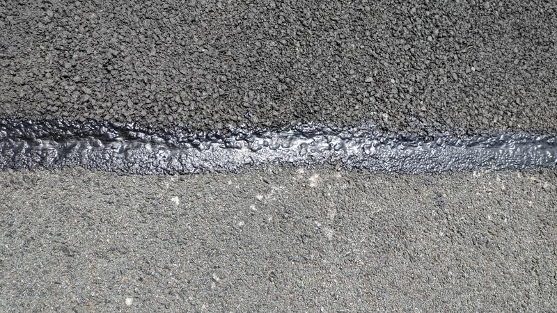 This was a deep "V" where old and new asphalt met.