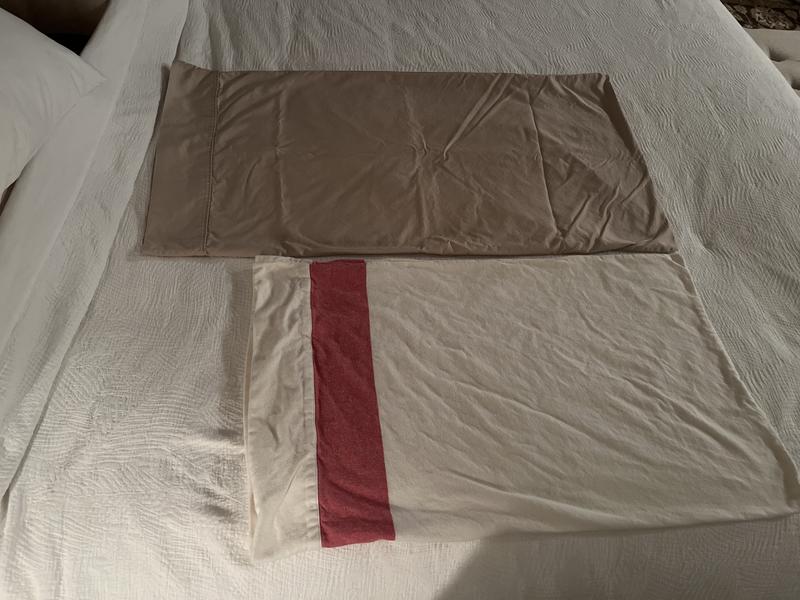 Above pillow case is a king and the bottom pillow case is the standard sized one that came with the king set.