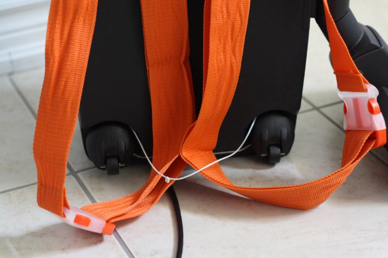 Just wrap some string agound the castors and bingo you got a backpack vacuum!