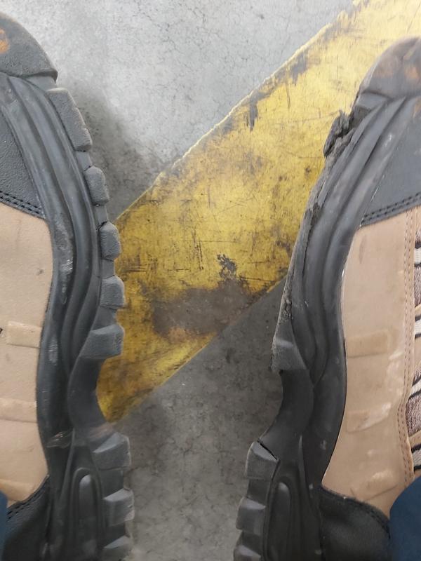 Shoe on left before the sole fell off. Shoe on right missing sole.