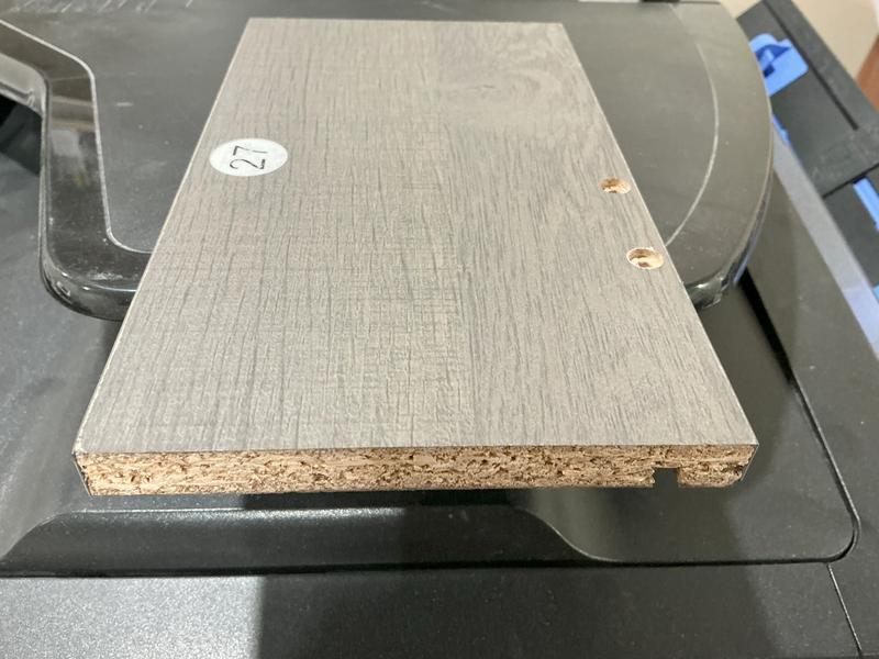 The thin piece at back had its holes offset, another piece without holes.  I couldn't get the drawer bottoms (floor) to sit within the grooves of the drawer sides!