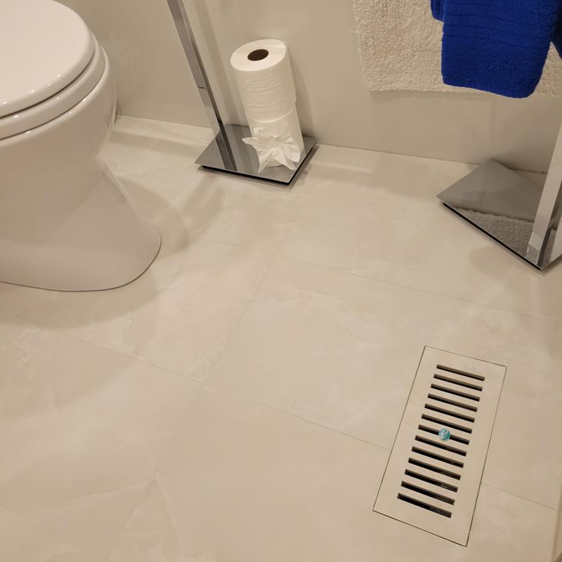 Bathroom, flush mount porcelain tile vent.