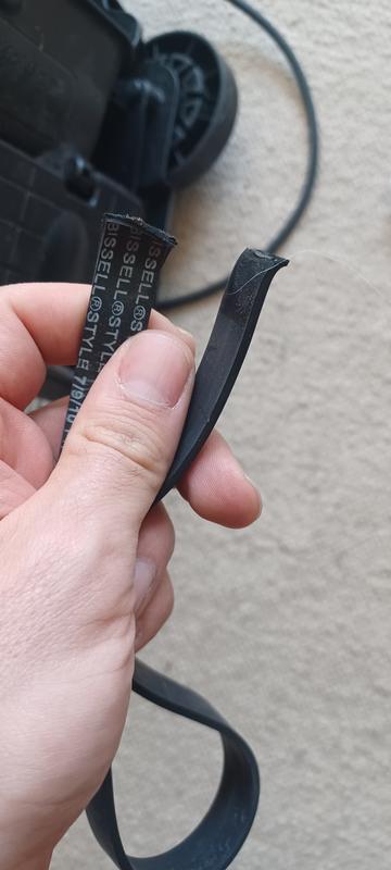 Belt melted through due to a buildup of hair that then ignited from being right beside the motor.