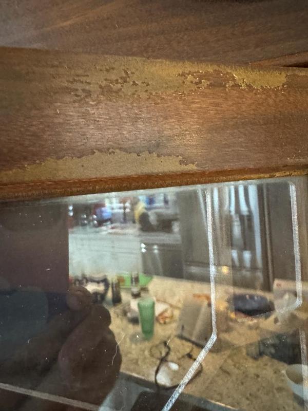 After spraying Method wood cleaner and wiping softly with a paper towel on an antique secretary