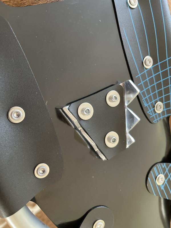 Pop rivets not installed correctly on heel assembly.