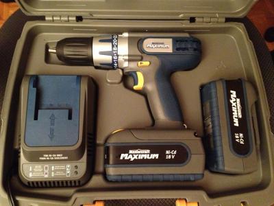 Drill with two batteries, charger, all in a hard plastic case