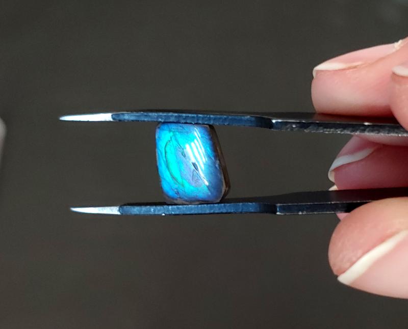 Ammolite piece after the sanding. I cut the sandpaper in sections and did this by hand, no power tools.