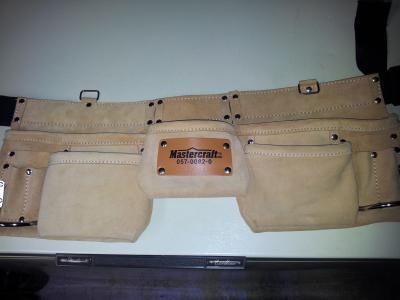 Apron is suede, not leather.