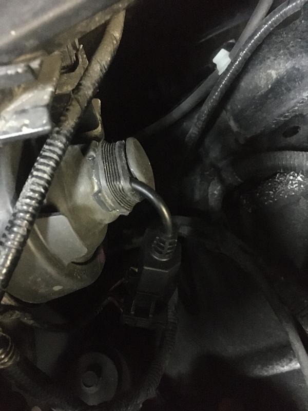 The heatsink pushes the rubber boot outwards leaving a gapping hole (plugged by a Ducati rubber cover)