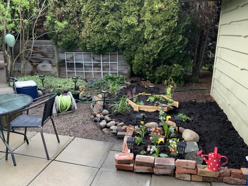 Waiting to water Baba’s plants