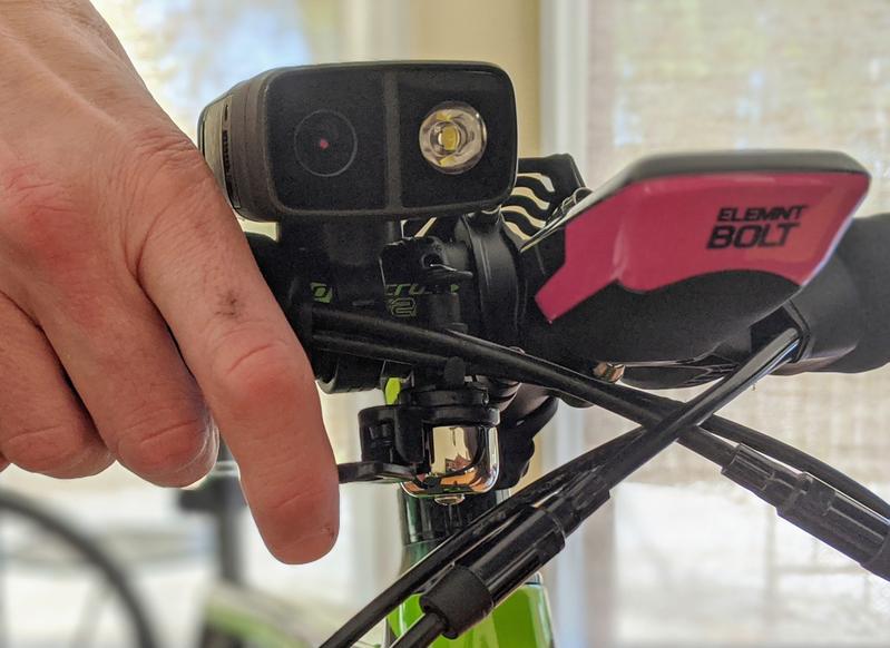 Bell mounted underside of bar for easy ringing