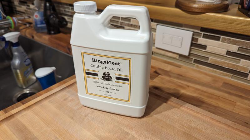 This is the oil I have been using for this cutting board and the countertops. You can also soak wood handled cooking utensils overnight in a ziplock bag with this oil.