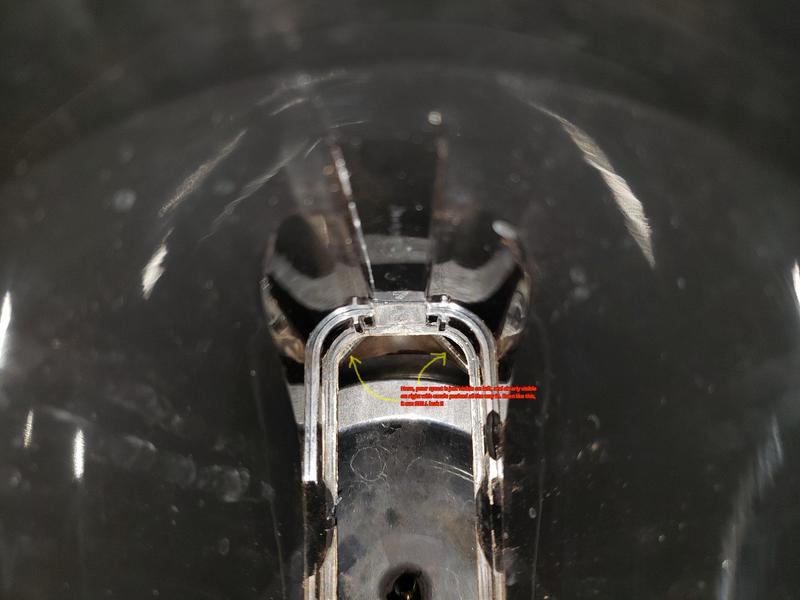 carafe fully inserted with handle dead 90 degrees to face of unit