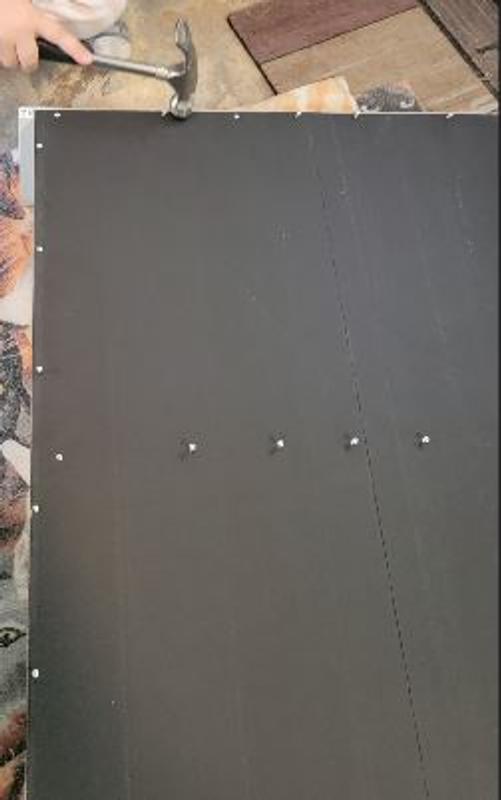 Nails are of quality that an 8 yr old can complete the task of attaching the backing