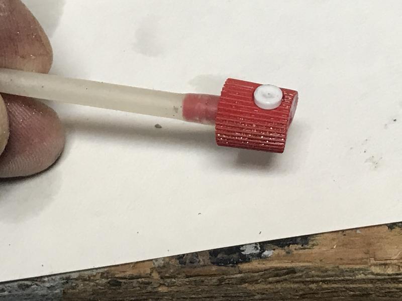 Tubing to clear nozzle