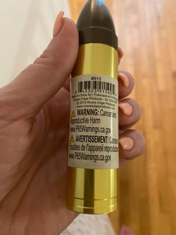 Strange and a bit harsh warning label for a flashlight