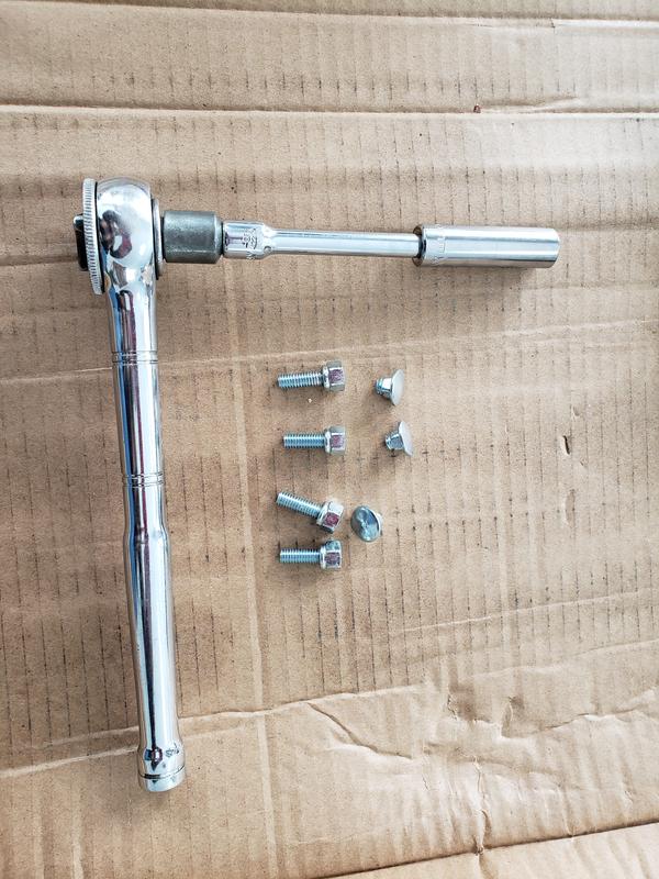 The 4 broken #W1 bolts and the wrench that broke them