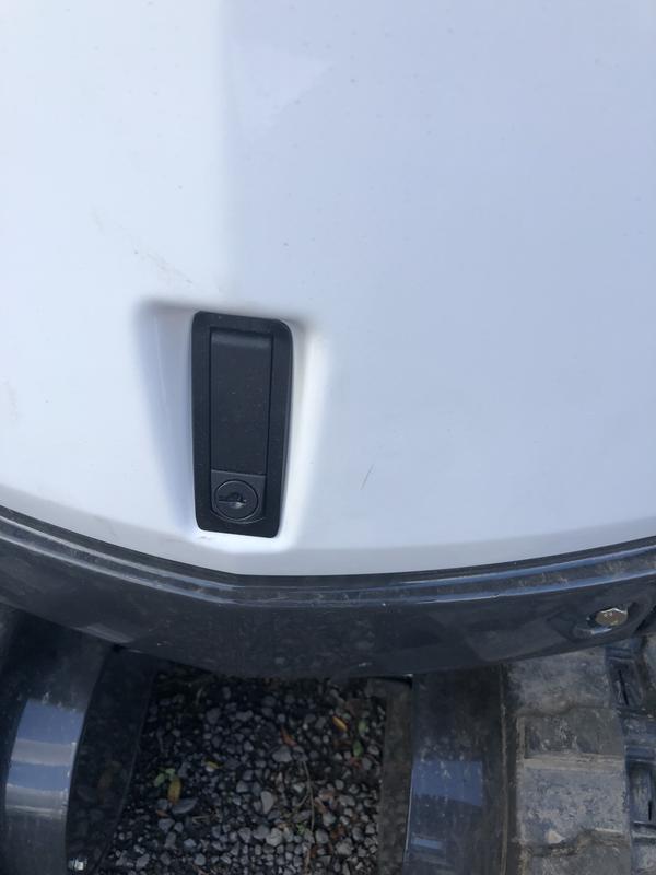 Refinished rear excavator door. Dents removed/filled. Door sanded, primer, painted and now good as new.