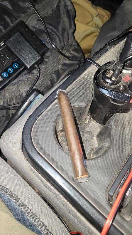 Just north of the cigar.