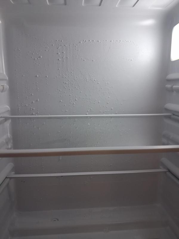 these are tiny ices in the walls. please help . does it have a problem with refregirator?