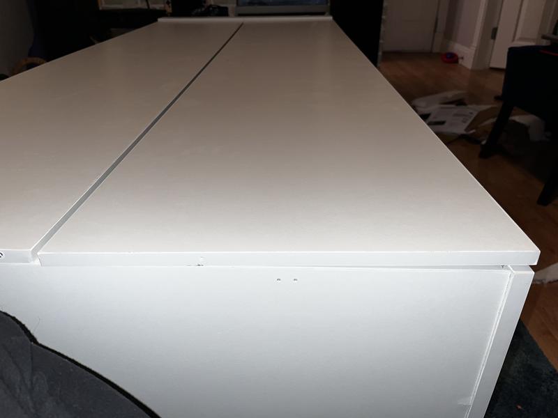 Door is cut unevenly. One corner is higher than the other