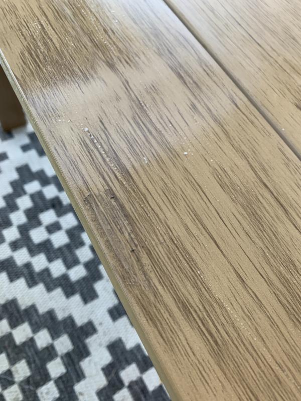 This is where some salad dressing spilled on the edge of the table before I could wipe it up it was eating through the paint.