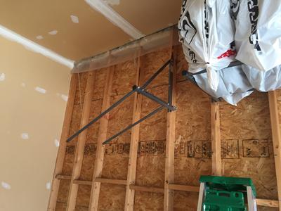 Portion remaining after one side failed with only 3 tires loaded on the rack ~115 lbs at the time of breaking and dropping all 3 tires to the ground.