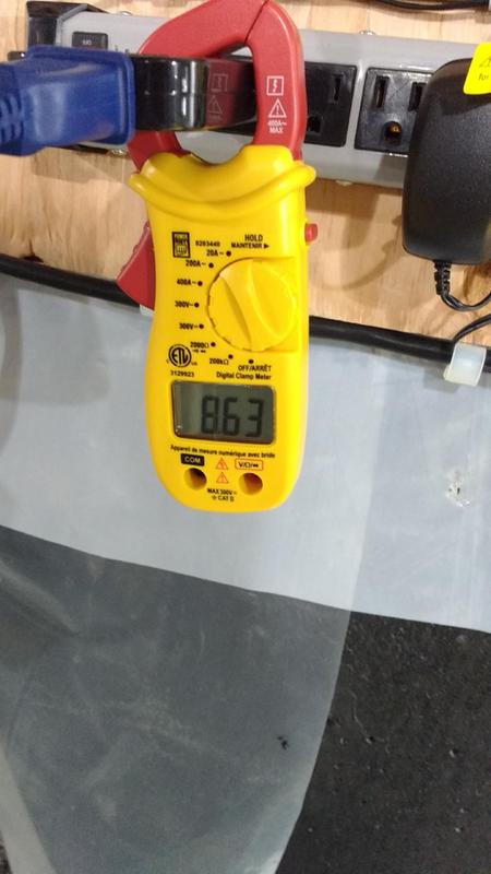 Sperry Line Split tester measuring current draw of ventilation fan