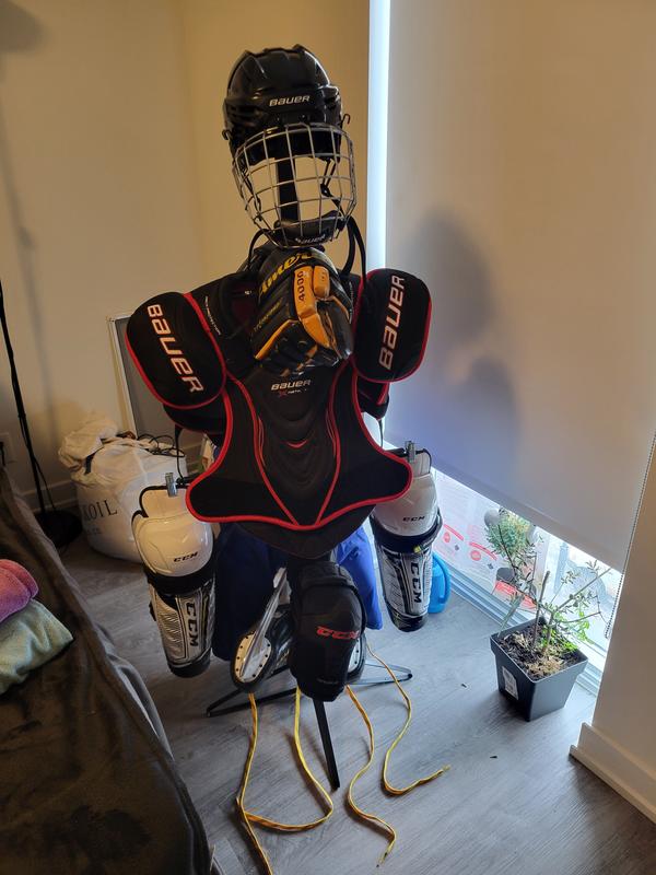 Senior large sized gear laid out on the rack.