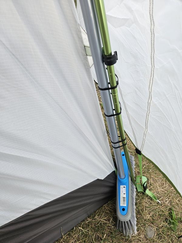 zip-ties with brooms to keep the tent upright in moderate wind
