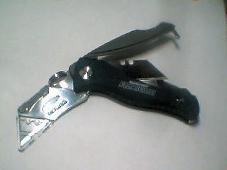 Knife and Storage Pocket open.