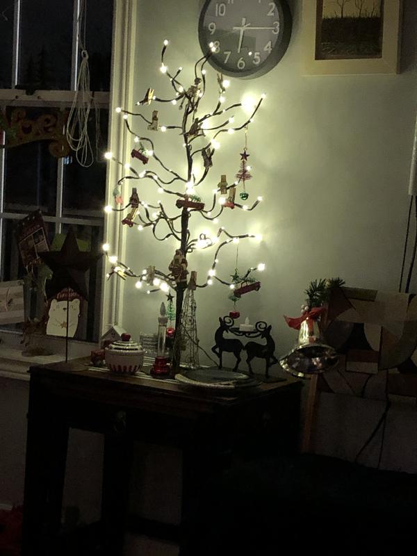 This little lighted tree has no switch, so saves me having to move furniture to turn it on and off.