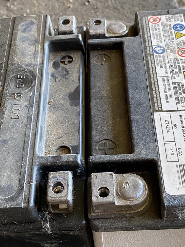 This isn’t the battery but it’s one just like it I got from the dealer. I thought I would try Canadian Tire to see if theirs fit. I made it fit by using the spacers. Put all back together and never thought to take a photo of it once in.