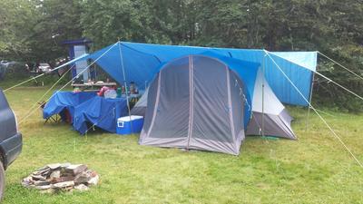 Poles used on ends and one side of tarp (fly).