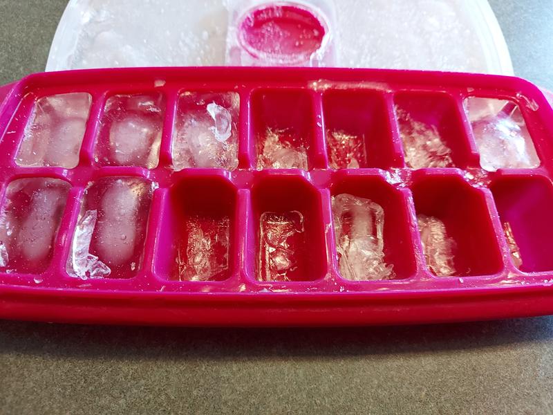 Ice cube fragments stuck in tray