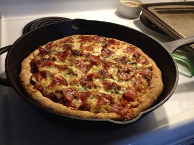 Pizza baked in cast iron skillet